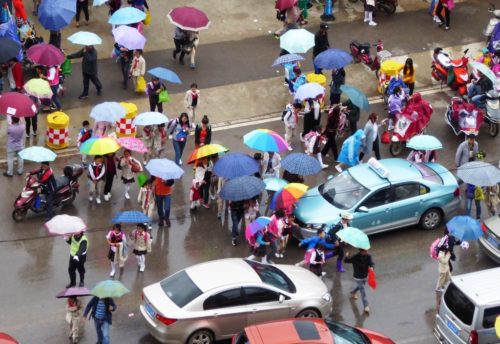 exiting-school-in-rain
